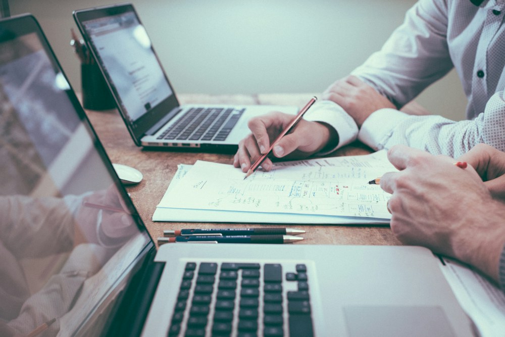 Financial advisors reviewing documents
